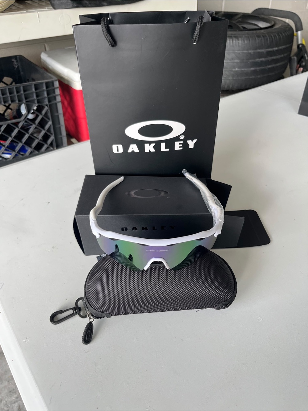 Oakley White Frame Sunglasses with Green Mirrored Lens
